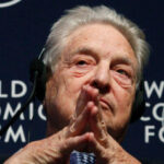 Soros Fund Management Chairman, Soros, attends a session at the World Economic Forum in Davos