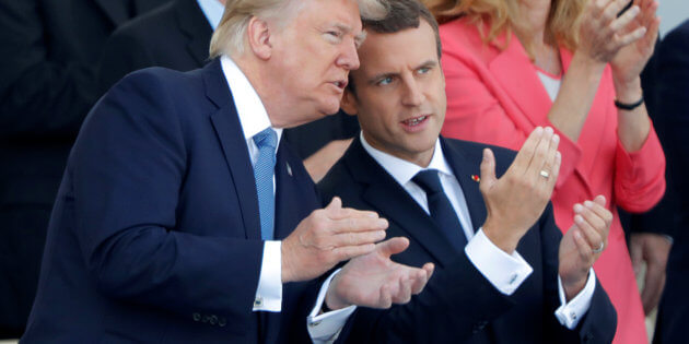 French President Emmanuel Macron and US President Donald Trump attend the traditional Bastille Day military parade on the Champs-Elysees in Paris