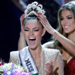 Miss South Africa Demi-Leigh Nel-Peters reacts as she is crowned by Miss Universe 2016 Iris Mittenaere during the 66th Miss Universe pageant at Planet Hollywood hotel-casino in Las Vegas
