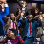 Les députés du Zimbabwe célèbrent après la démission de Mugabe