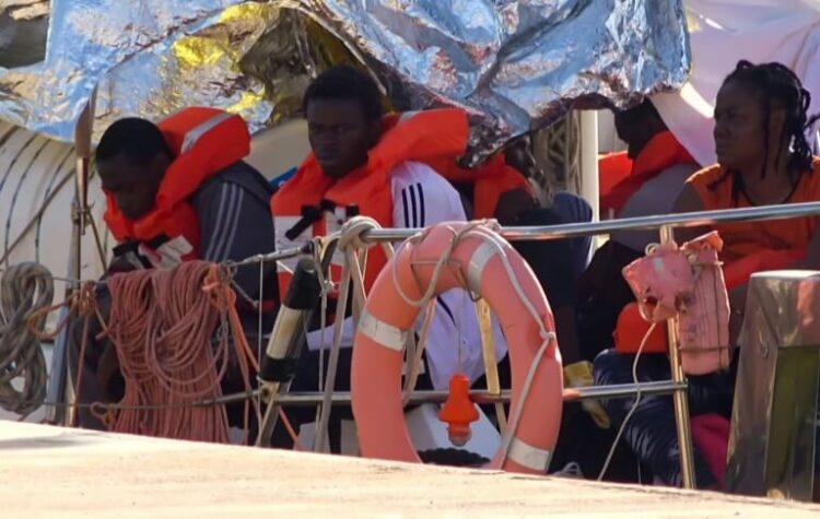 Des migrants en Italie